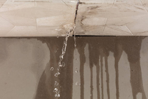 Professional Flood Damage Cleanup technician working in Worthington, MA